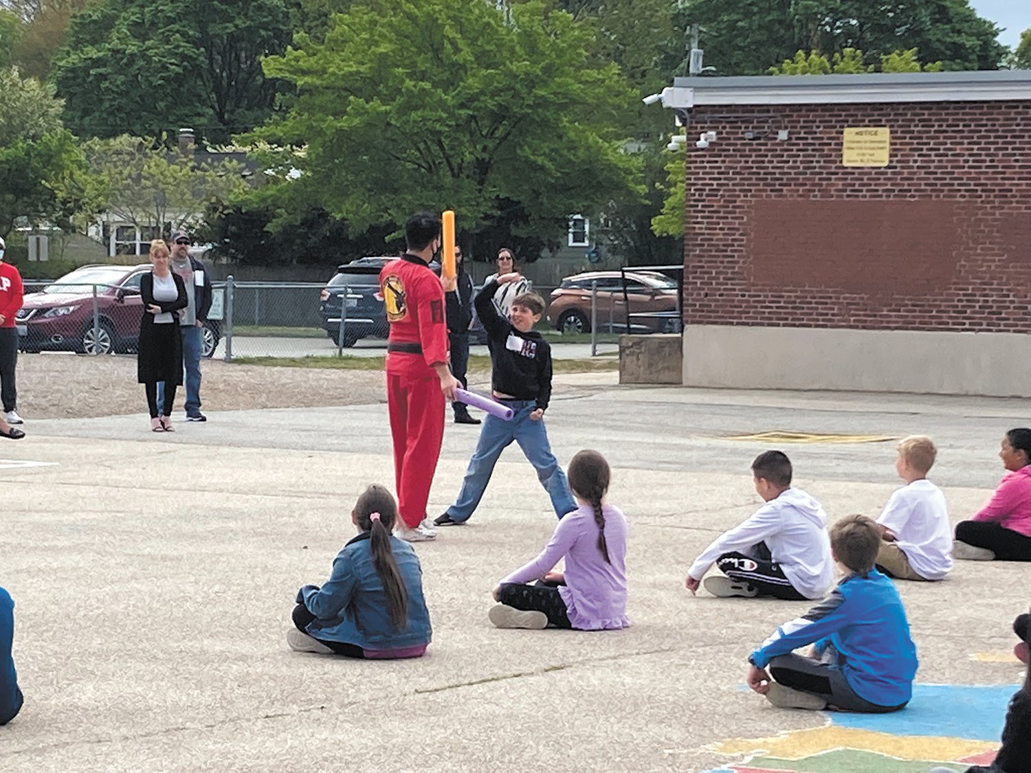 EXCITED VOLUNTEER: Fifth grader Eli Martin volunteers to demonstrate the skills he’s learned over the past four weeks while taking Taekwondo in Brianna Brigidi phys-ed class at Robertson Elementary School.
